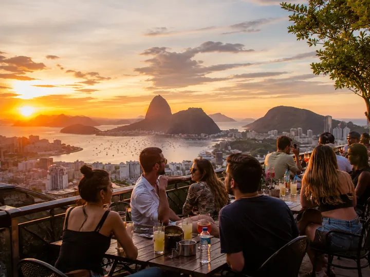 Sunset over Sugarloaf Mountain seen from a Rio rooftop