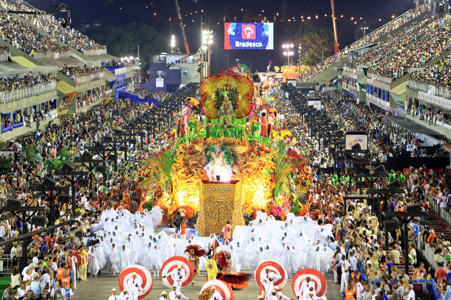 Rio Carnival, a samba school float lighting up the Sambadrome at night